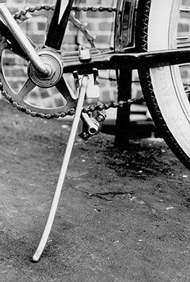 A bike kickstand, one of the original H.E. Williams inventions